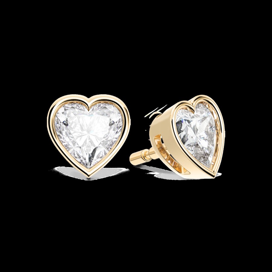 ad Heart shape trendy Diamond studs – Jewelskreation-by jiya bhojwani